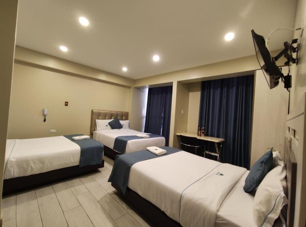 Hotel Konford Canete Imperial Bagian luar foto